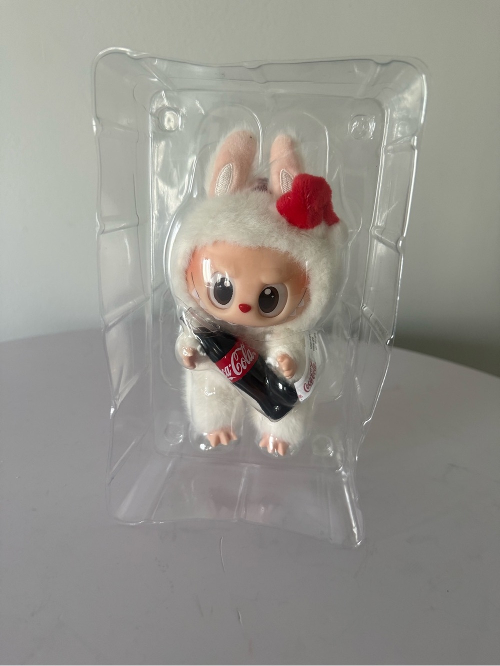 White Bunny Plush Doll with Red Bow and Black Bottle Accessory
